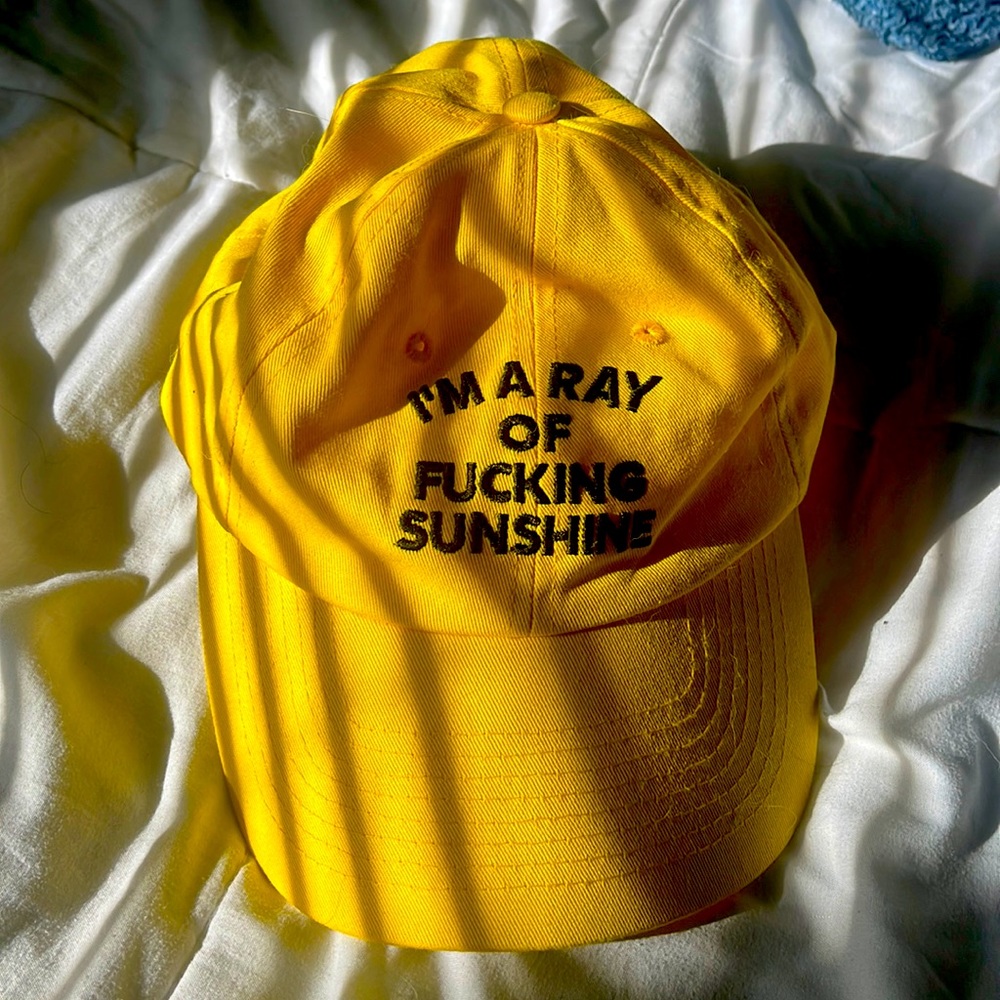 Yellow “I’m a ray of F* sunshine” hat, one size fits all!